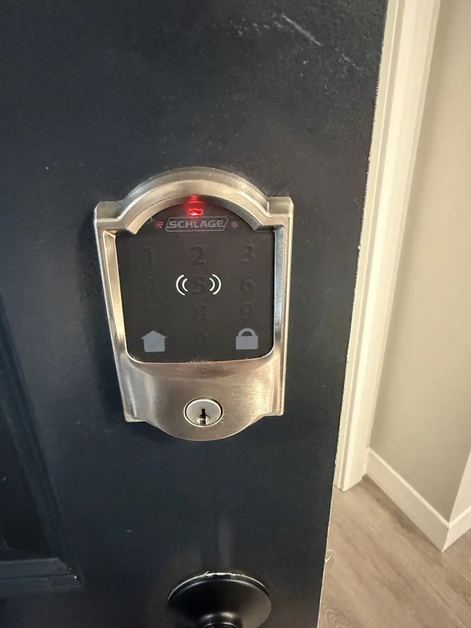 Schlage keypad smart deadbolt installed on a home door