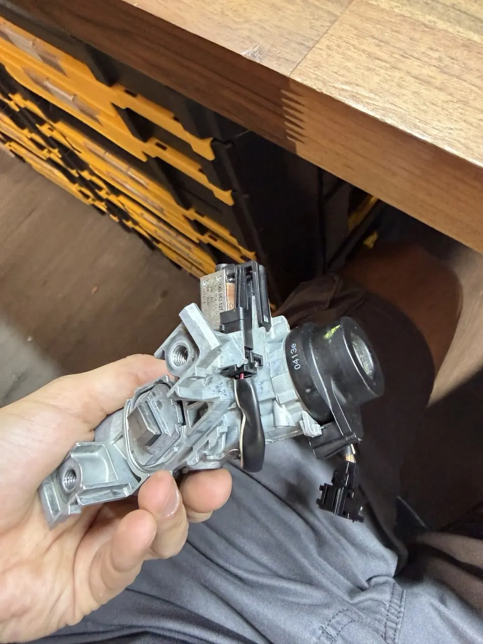 Ignition lock assembly on the workbench, ready for repair